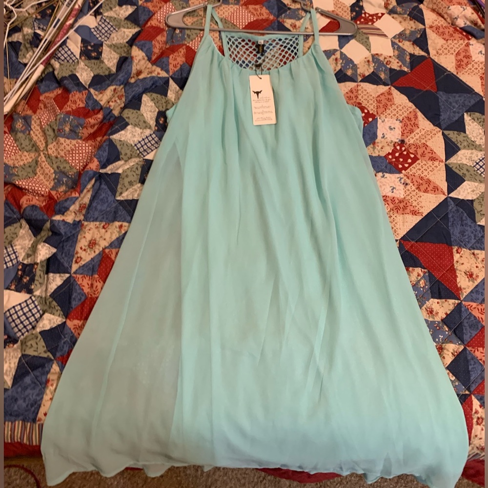 Turquoise spaghetti strap dress with tags still on